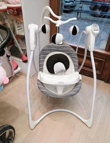 Njihalice: Graco električna ljuljaška za bebe - Stabilan ram u obliku slova A sa