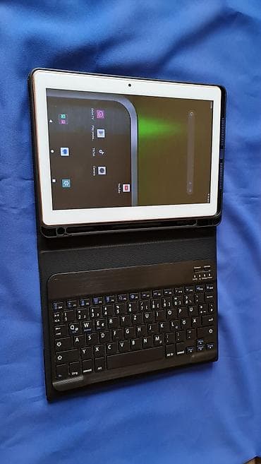 Tablet sa 2 sim kartice,maskom I blutut tastaturom, kao nov nema mane