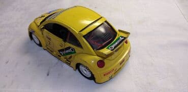 gramofonske ploce beograd: Burago VW New beetle,1:24,malo izgreban,sve ostalo original — 3
