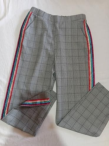 Ženske pantalone sa karo dezenom i sjajnim prugama sa strane.Nove na lalafo.rs Ženske pantalone sa karo dezenom i sjajnim prugama sa strane.Nove