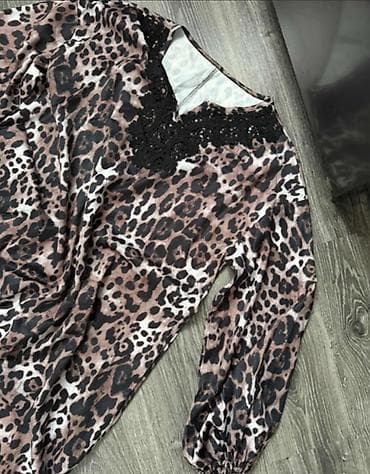 haljne: Nova haljina od lepog materijala, animal printa, ukrašena čipkom — 2