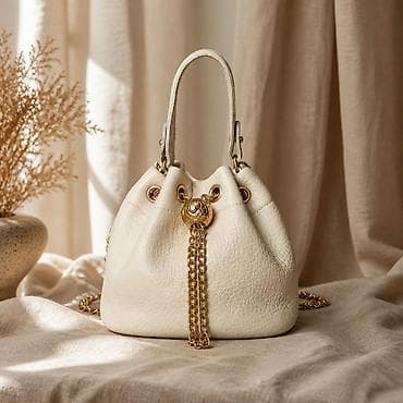 mona torbe polovne: Kožna torba-buket (bucket bag) u boji slonovače sa zlatnim detaljima — 7