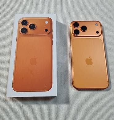 renda za kupus: Apple iPhone u narandžastoj boji – model sa trostrukom zadnjom kamerom — 1