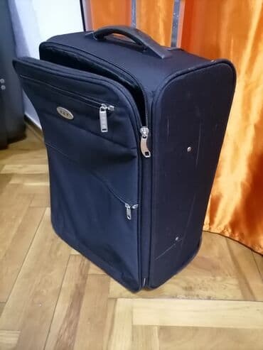 teget torbe: Medium suitcase, color - Black — 2