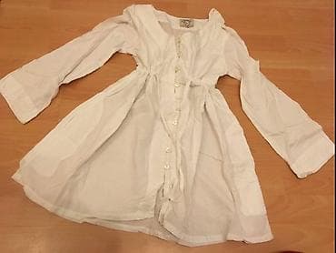 Kosulja moze i za trudnice,podesava se u struku.Sa vezom na lalafo.rs Kosulja moze i za trudnice,podesava se u struku.Sa vezom