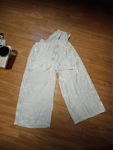 Damski komplet – široke pantalone i prsluk/bolero u boji šampanjca na lalafo.rs Damski komplet – široke pantalone i prsluk/bolero u boji šampanjca