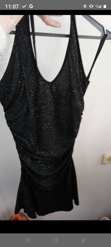 duboke kozne pantalone: Set crnih haljina – elegantni modeli za različite prilike - Haljina — 2