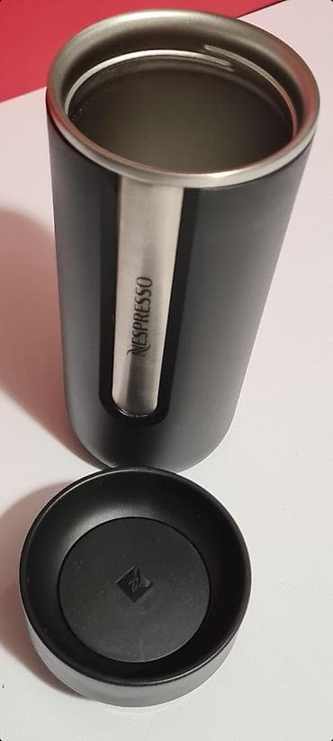 Sobne biljke: Nespresso Nomad termo putna šolja u crnoj boji.  Predmet nije nov, ali — 6