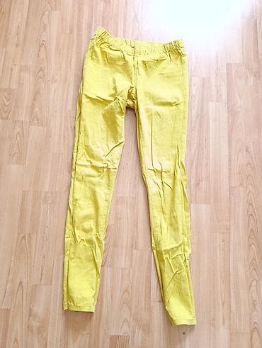 Ženske žute pantalone/helanke - Model: uske, ravne nogavice, dužina — 1