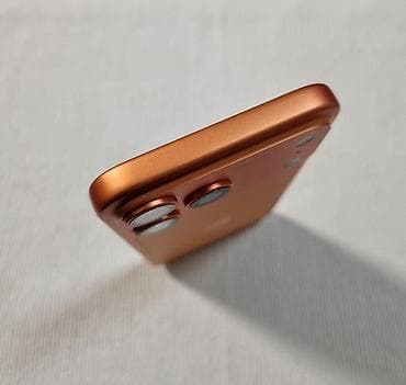 renda za kupus: Apple iPhone u narandžastoj boji – model sa trostrukom zadnjom kamerom — 5