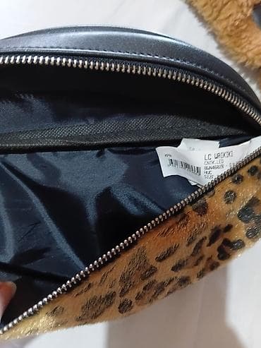 postava cincila: Ženska jakna od eko kože sa detaljima od veštačkog krzna + torbica — 7