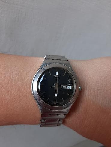 Swotch original sat ispravan na satu ima mala crta na staklu neulazi