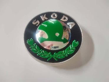 gume za auto pancevo: ČEPOVI ZA ALU FELNE 55MM ZA ŠKODA RAPID, FABIA, FELICIA . | Čepovi — 2