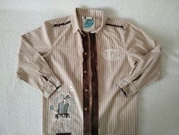 Ski odeća: Kosulja Todor za decake
Velicina 10
Cist pamuk — 2