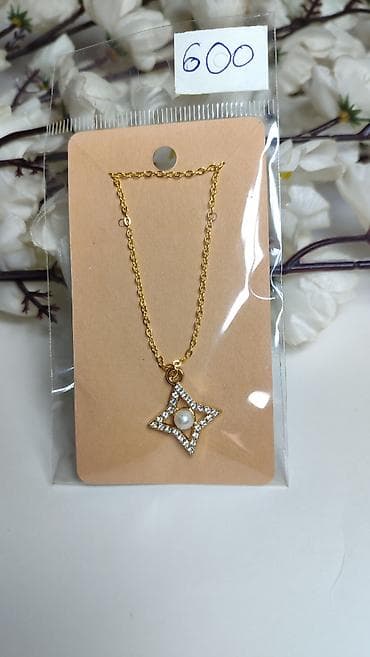 sat fossil cena: Zlatno ogrlica sa priveskom – zvezdica sa biserom - Lančić u zlatnoj — 1