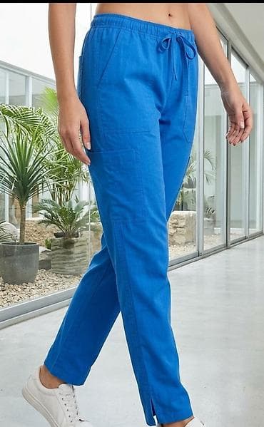 Ženske pantalone – plave - Kroj: ravne nogavice sa malim prorezom na na lalafo.rs Ženske pantalone – plave - Kroj: ravne nogavice sa malim prorezom na