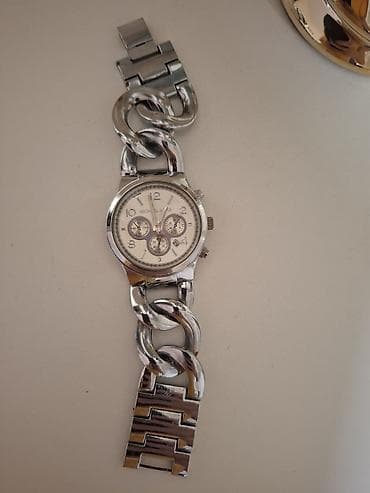 mindjuse karike: Ženski ručni sat Michael Kors, izrađen od metala u srebrnoj boji — 1
