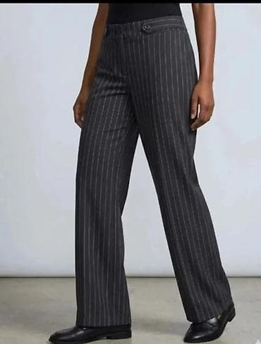 Ženske pantalone na pruge, elegantnog kroja sa ravnim/širim na lalafo.rs Ženske pantalone na pruge, elegantnog kroja sa ravnim/širim