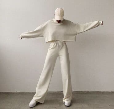 trenerke kompleti: Komplet crop top dux i donji deo zvonast. crna boja sa elastinom — 1