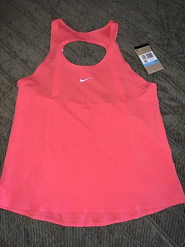 halji: Nike Pro Women's Dri-FIT Tank Top vel. XS, M 
Recycled Materials
IB — 5