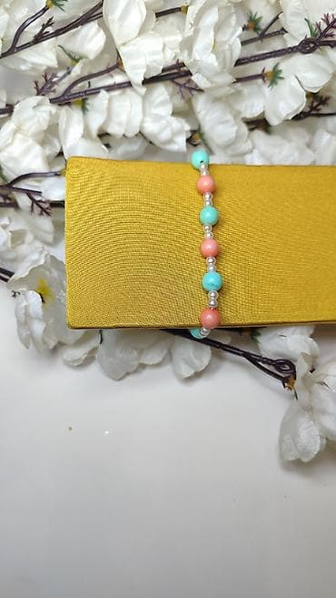 Narukvica od perlica u pastelnim tonovima - Dizajn: niz okruglih