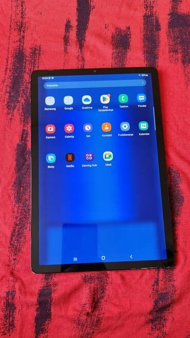 e knjige: Tablet veliki 10.5 inca,kao nov sve radi ima za sim karticu,vrhunska — 1
