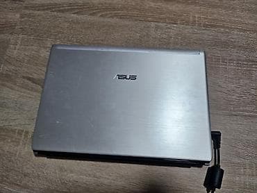 inspiron 1545: ASUS laptop (serija U/UL) – srebrno kućište sa crnim detaljima — 2