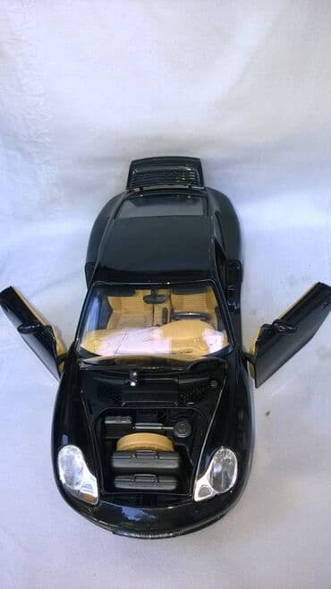 lov i ribolov smederevska palanka: Burago Porsche 911 Carrera,Italy,fale levi p.i z.zmigavac,naprslo — 2