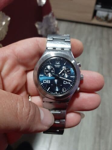 Jewellery: Swotch ispravan sat sat je original sviss made ima jednu linijicu sa — 9