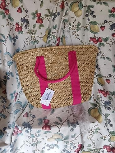 Pletena torba od prirodnih vlakana sa ručkama u jarko ružičastoj boji