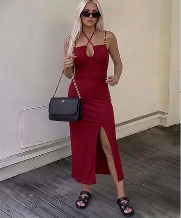 roze odelo: Ribana midi haljina sa prorezom i ukrštenim bretelama
1800
Din
S M L — 3