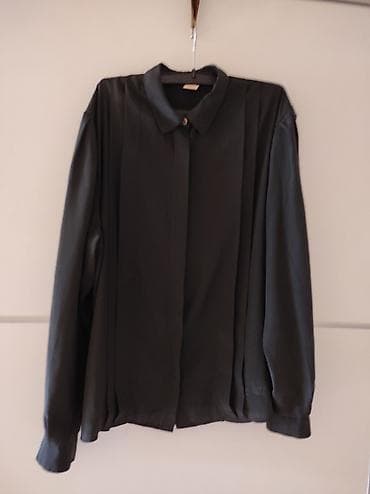 Crna kosulja. Poluobim grudi 61 ramena 44, rukav 64, duzina 65