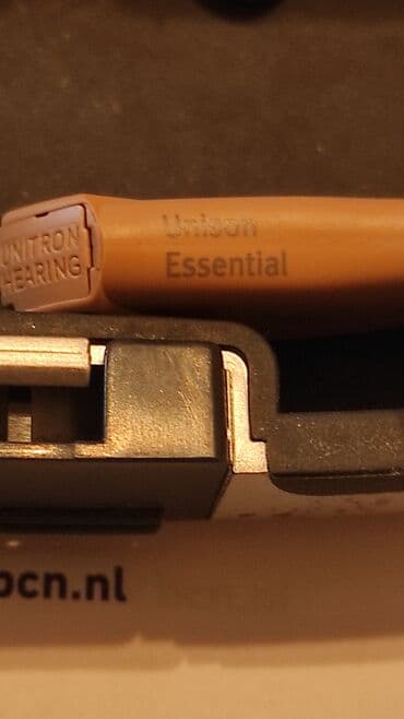 Slušni aparati: Slusni aparat Unitron. model. Essential hearing. use Proveren ispravan — 8