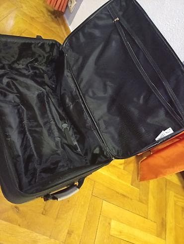 sat za ruku: Veliki kofer na točkićima sa teleskopskom ručkom. OKO 75 40 25. dob — 5