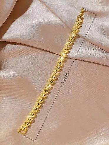 narukvice kao pandora: Zlatne narukvice – dva modela Model 1: - Dizajn: niz sjajnih “X” i — 3