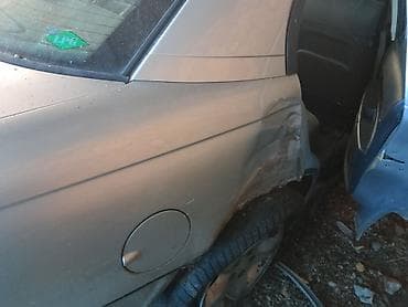 Auto delovi, gume i tjuning: Opel Omega B – limuzina, srebrna, zadnja desna strana oštećena Opis — 6