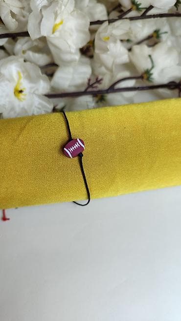 new yorker ogrlice: Narukvica sa priveškom u obliku ragbi lopte - Tanka, crna podesiva — 1