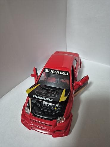 Subaru Impreza model razmere 1:24 dobro očuvan sa par nedostataka — 2