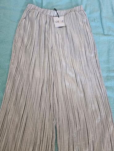 Ostale pantalone: Ženske pantalone – dva modela 1) Crveno‑bele pantalone sa — 3