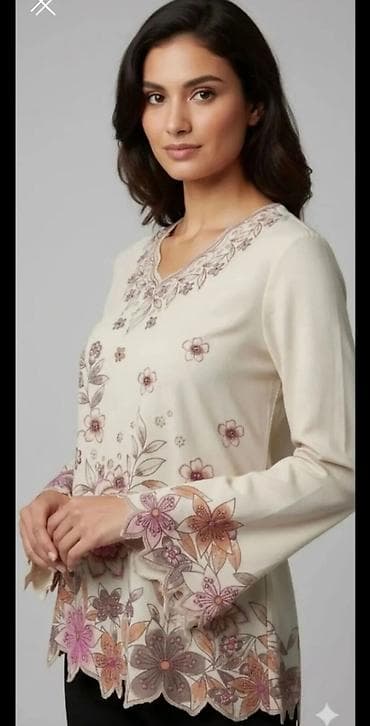 Ženska bluza sa dugim rukavima, u svetloj krem nijansi, sa bogatim na lalafo.rs Ženska bluza sa dugim rukavima, u svetloj krem nijansi, sa bogatim