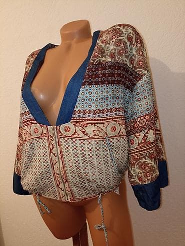 Zara majica/ogrtac je kao nova.Velicina M