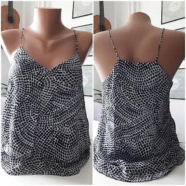 H&M majica
Velicina 36
Zaista kao nova na lalafo.rs H&M majica
Velicina 36
Zaista kao nova