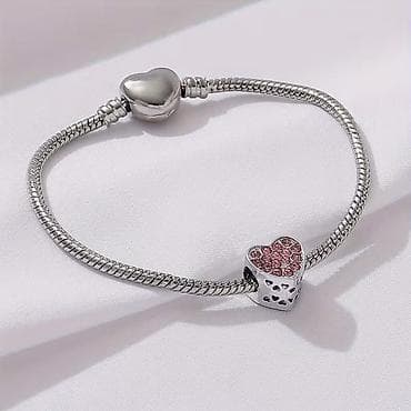 van cleef narukvica cena: Srebrnasta narukvica sa šarmom u obliku srca - Elegantna „snake — 3