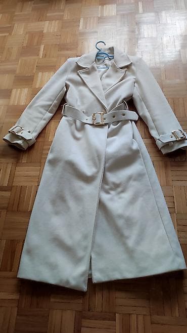 Muška odeća: Elegantni ženski kaput sa pojasom – boja slonovače (krem/bela). - — 2