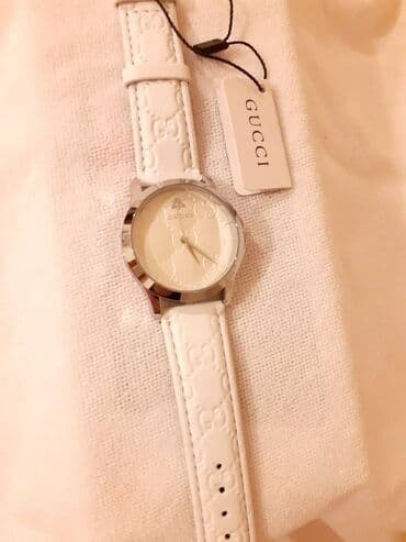mona bele torbice: Classic watch, Gucci, Female — 4