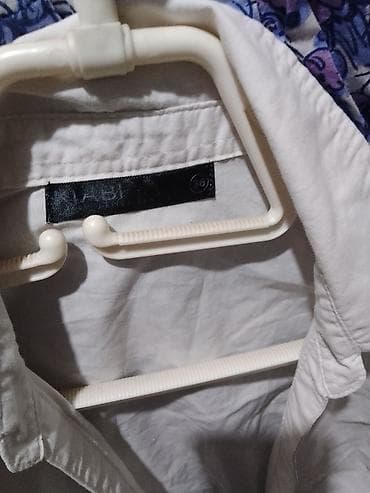 luna bluze 2023: Ženska bela košulja bez rukava - Klasčan kragnasti model, na kopčanje — 2