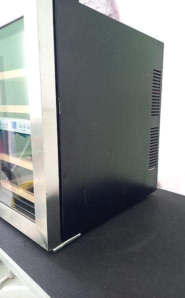 cd changer bluetooth adapter cena: Vinski frizider CaNdOr 220V Ispravan vinski frizider poznatog — 6