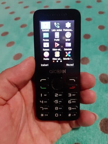 Alcatel: Alkatel model 2038 ispravan telefon radi na sve mreze ide u njemu i — 2