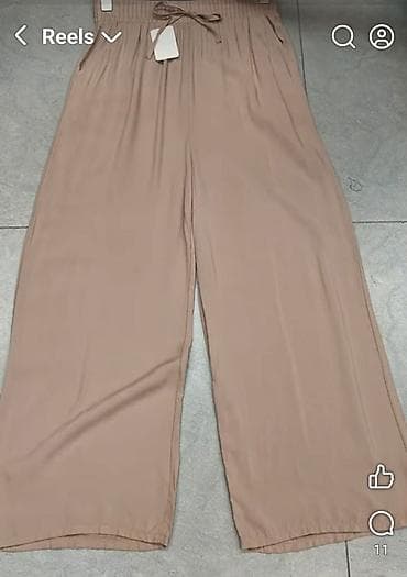 Pantalone udobne siroke sa elasticnim pojasem.Bez,svetlo plava,puder