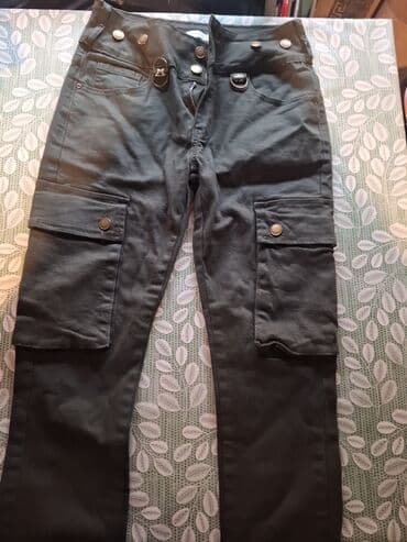 Radne/cargo pantalone tamno sive boje sa više džepova i metalnim na lalafo.rs Radne/cargo pantalone tamno sive boje sa više džepova i metalnim